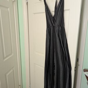 Lulu's Black and White Striped Jumpsuit with Plunging V-Neck